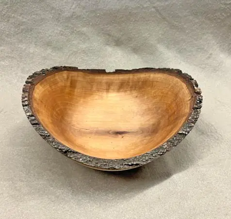 A pear-shaped wooden bowl