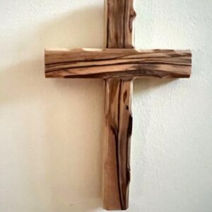 A large olive wooden cross