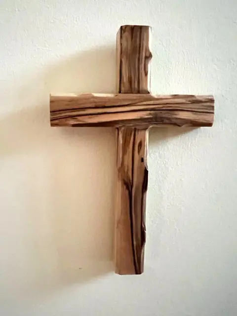 A large olive wooden cross