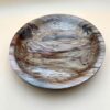 Wooden bowl with unique grain pattern.