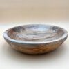 Wooden bowl with natural grain patterns.