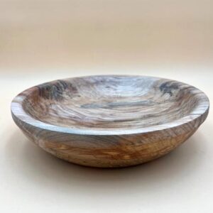 Wooden bowl with natural grain patterns.