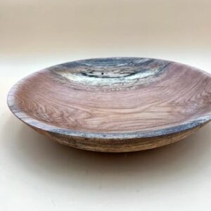 Wooden bowl with natural grain patterns.