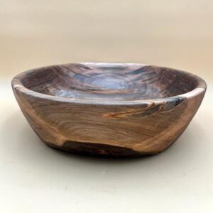 Wooden bowl with natural grain pattern.