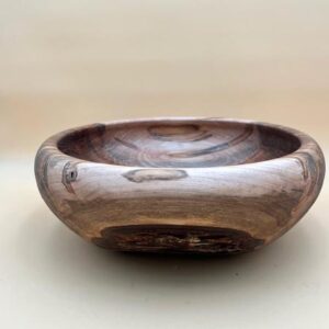 Wooden bowl with a natural grain pattern.